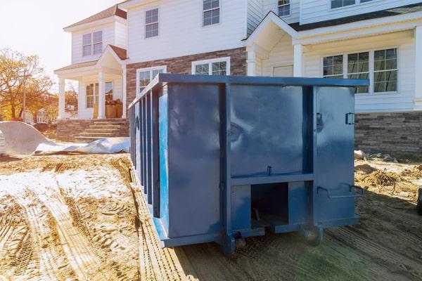 workers at Deerfield Beach Dumpster Rentals